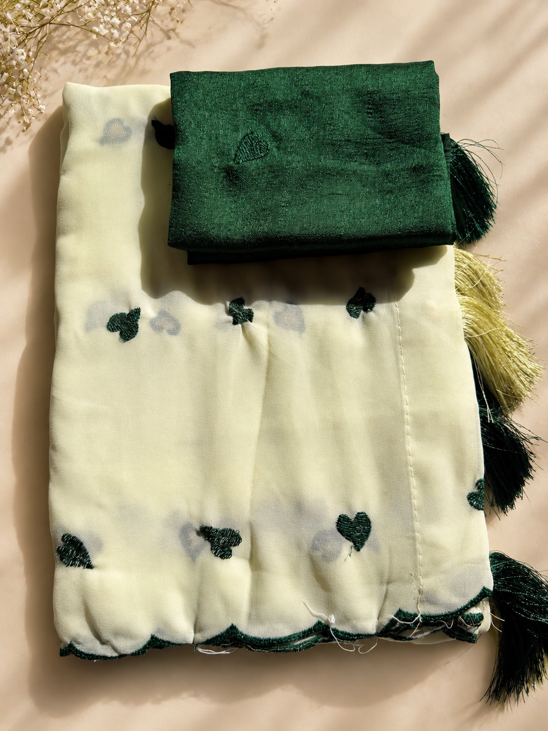 💚 Elegant Cream & Bottle Green Heart Embroidered Saree with Tassels