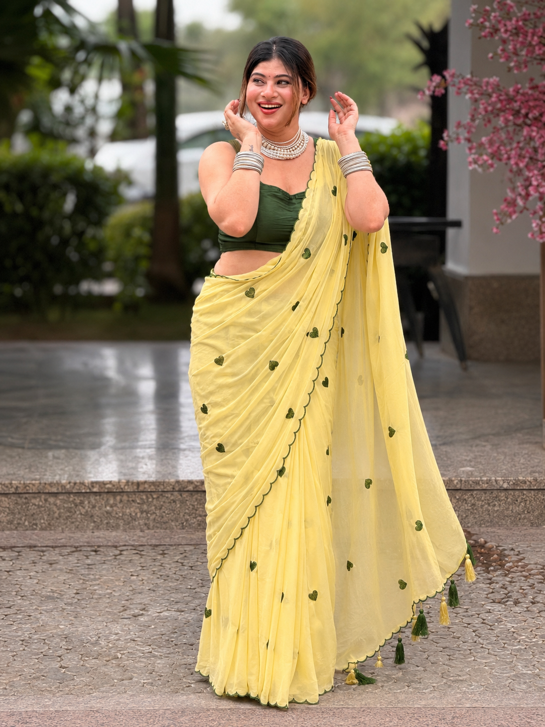 Lemon Yellow Heart Embroidered georgette Saree with Green Scallop Border