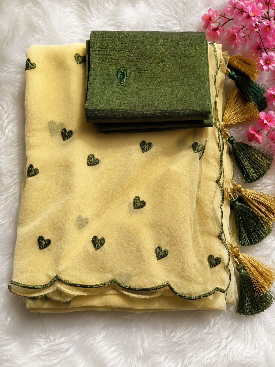 Lemon Yellow Heart Embroidered georgette Saree with Green Scallop Border