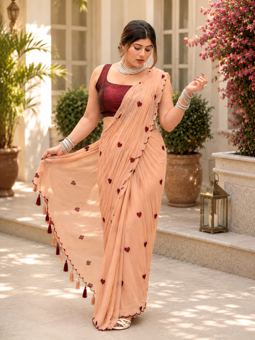 Blush Pink Heart Embroidered georgette Saree with Tassel Border